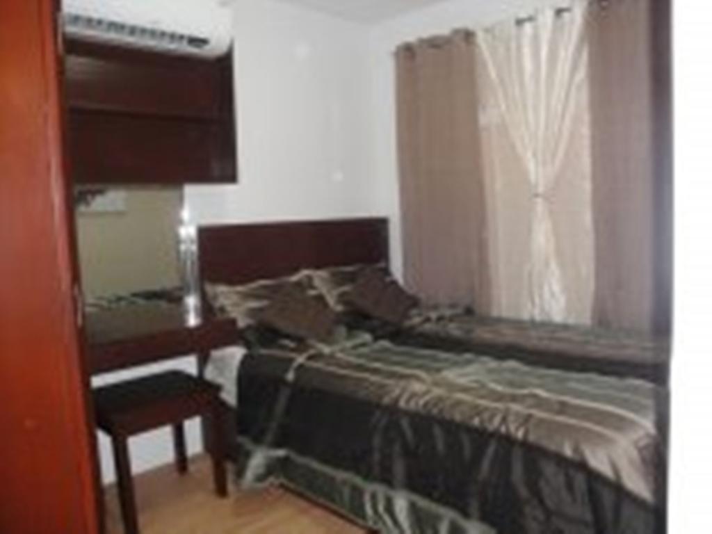 The Oasis Davao Condotel Habitación foto