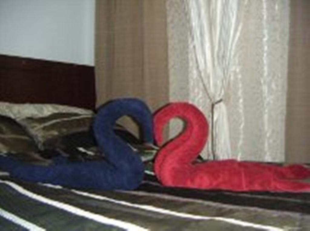 The Oasis Davao Condotel Habitación foto