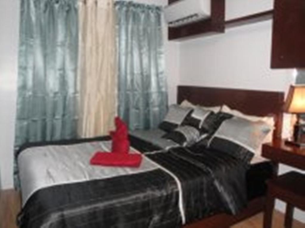 The Oasis Davao Condotel Habitación foto